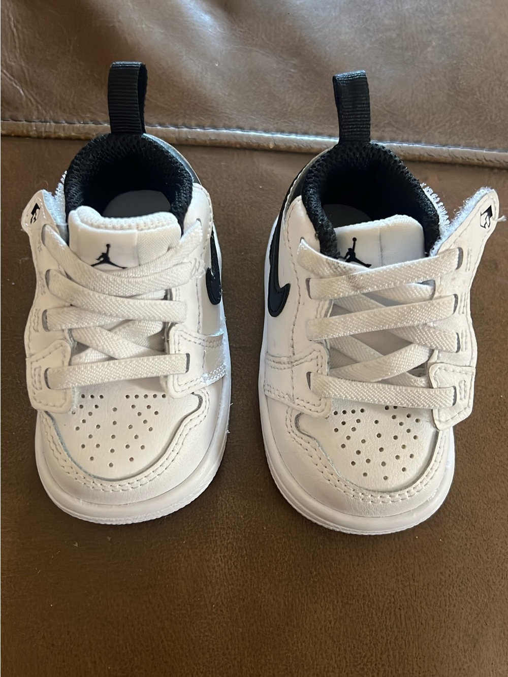 Nike Toddler Sneakers in White and Black with Jumpman Logo